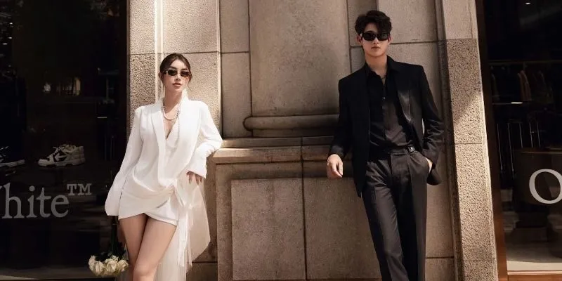 Cách pose dáng ấn tượng khi chụp ảnh cưới với background tường đá